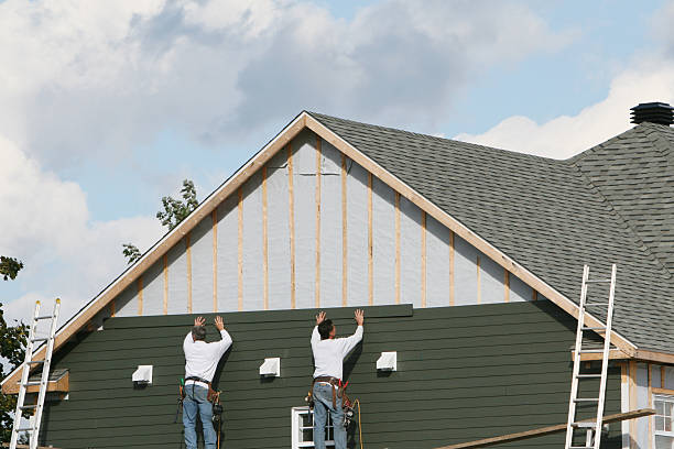 Professional Siding Installation technician working in Falls Church, VA